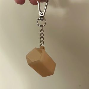 Fenty lip gloss keychain holder.